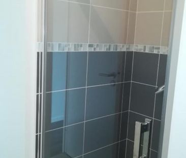 Location Appartement 2 pièces 47m² HEROUVILLE ST CLAIR 14200 - Photo 5