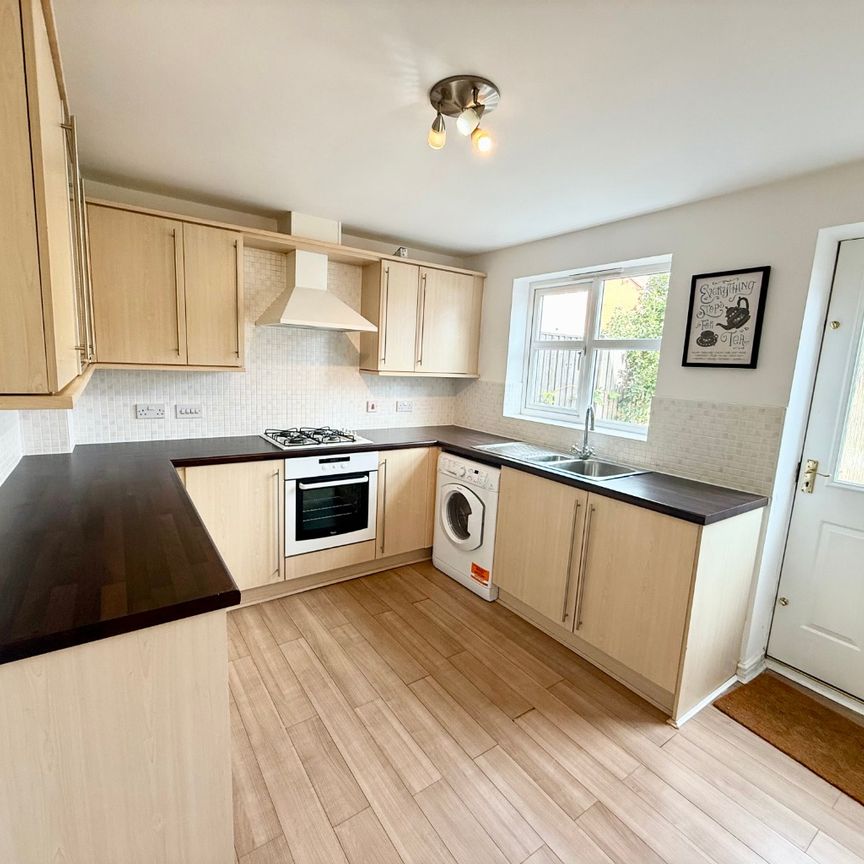 Modern mid-terraced home in Ruddington with driveway and garden - Photo 1
