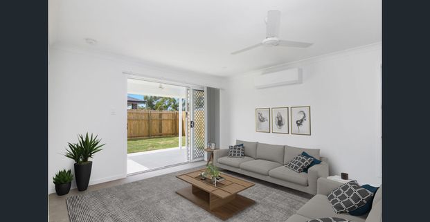 Modern 4-Bedroom Home with Large Backyard & Multiple Living Areas! - Photo 1