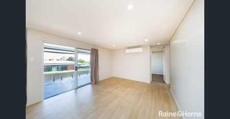 Stylish Elevated Home in Great Location - Photo 2