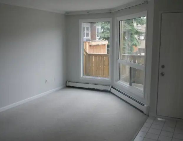 1 Bedroom, $1600, Very bright and spacious unit, private large deck! | 13 - 113 22 Avenue Northeast, Calgary - Photo 1