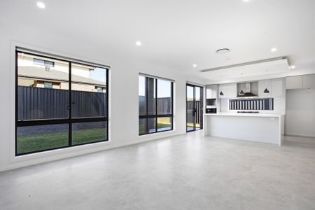 NORTH FACING Brand New Family Home with Five Bedrooms, Multiple Living Areas & Premium Finishes! - Photo 4