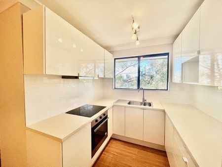 Beautifully Renovated Two-Bedroom Unit! - Photo 4