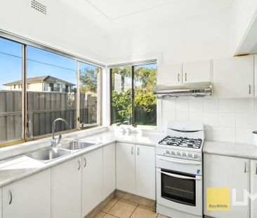 RENOVATED FAMILY HOME - Photo 1