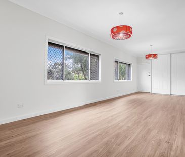 Spacious Family Home with Freshly Painted Interiors and Pool! - Photo 3