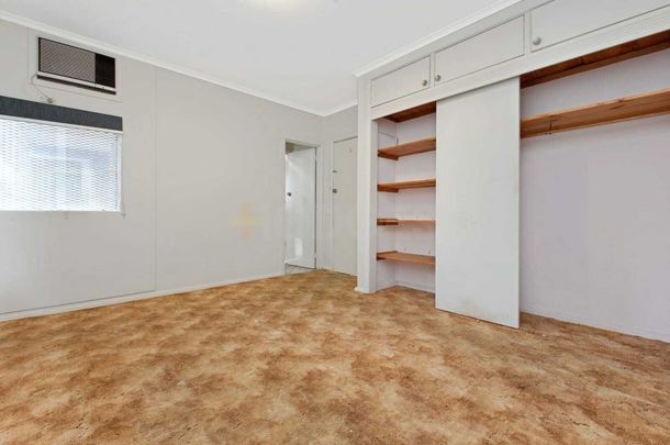 Register to Inspect / Spacious 4-Bedroom Home with Large Backyard in Prime Location - Photo 1