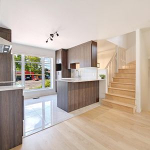 Maison en rangé à louer aux abords de la rivière des Prairies à Laval - Photo 2