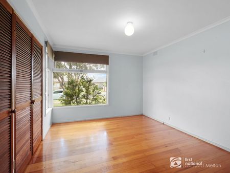 Charming Three-Bedroom Home - Photo 3