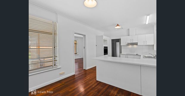 Located in Sought After Suburb - Neat & Tidy Family Home - Photo 1