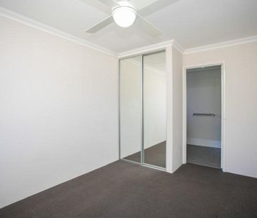 Coastal Comfort: Your Family Home Steps Away from the Beach! - Photo 4