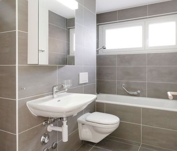 Appartement de 3.5 pièces au rez-de-chaussée - Photo 2