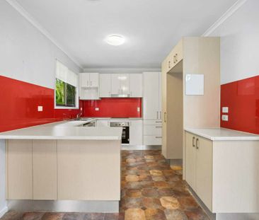 Family Home with Outdoor Entertaining & Drive-Through Garage - Photo 5