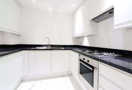 Newly refurbished, four double bedroom ground and lower ground floor apartment on Lexham Gardens. - Photo 3