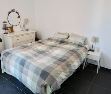 Knus en energiezuinig appartement met 1 slaapkamer en 2 terrassen. - Photo 1