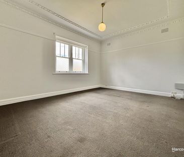 Charming Three Bedroom Home with Sunroom & Large Backyard... - Photo 2