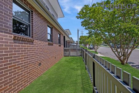 Three bedroom, two bathroom townhouse with double auto-door garage - Photo 2