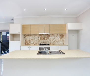 Stylish Townhouse with Secure Side-by-Side Parking - Photo 6