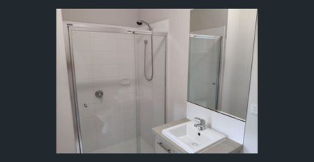 Modern Three-Bedroom Townhouse with Stylish Living in Prime North Melbourne Location - Photo 3