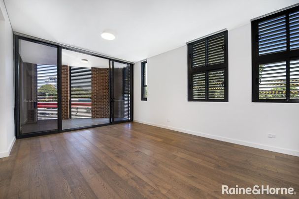 Stylish and modern living in a lively and vibrant environment - Photo 1