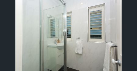 Stylish Two-Bedroom Home with Huge Alfresco Deck & Family-Friendly Yard - Photo 4