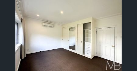 CLASSIC BRICK FAMILY HOME WITH MODERN UPDATES - Photo 4