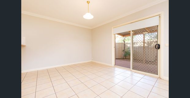 Neat, centrally located townhouse. - Photo 1