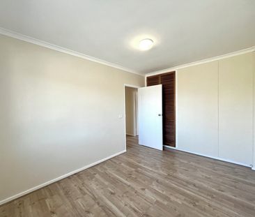 LOVELY TWO BEDROOM APARTMENT IN IDEAL LOCATION - Photo 6