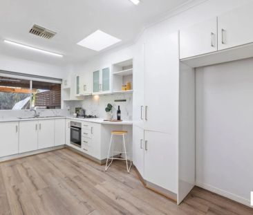 Modern 2-Bedroom Unit with Low-Maintenance Yard - Photo 1