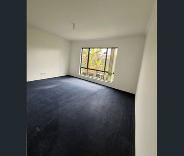 Modern 3-Bedroom Home with Study and Solar Panels - Photo 2