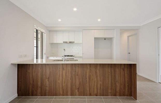 Neat and tidy Family Home with Secure Back Yard - Photo 1