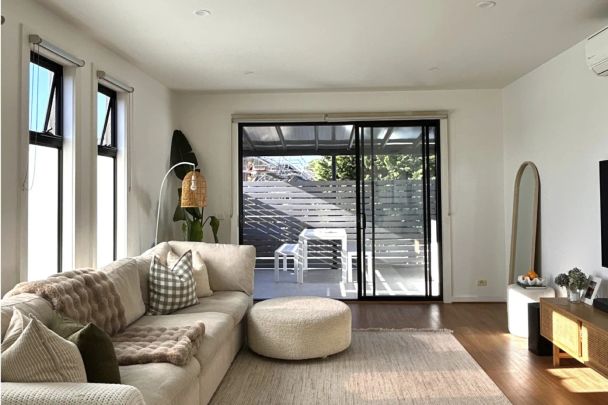 STYLISH TOWNHOUSE WITH INDOOR & OUTDOOR FLAIR! - Photo 1