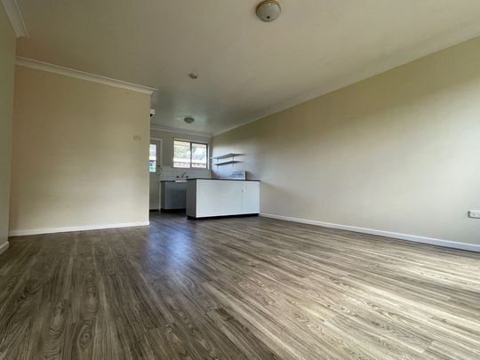 Brick 2-Bedroom Unit in Convenient Location - Photo 1