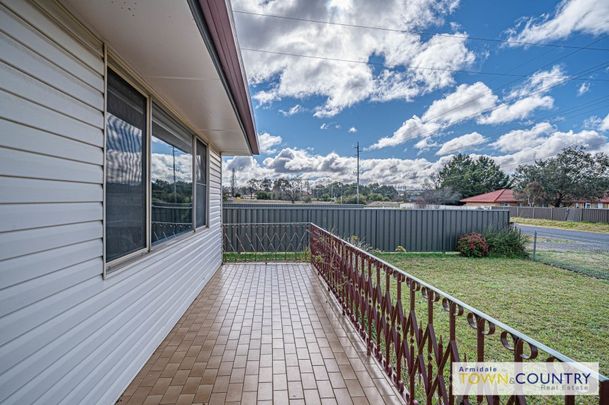 RENOVATED HOME WITH SPACIOUS LIVING - Photo 1