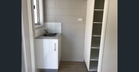 CONVENIENTLY LOCATED TWO BEDROOM UNIT - Photo 2