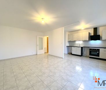 Location Appartement 3 pièces 60m² - Photo 2