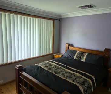 Large 4 bedroom family home located in the heart of Long Jetty. - Photo 4