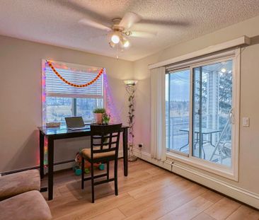 Spacious 2 Bed, 2.5 Bath Condo In Shawnessy | Fireplace, Balcony & ... - Photo 1