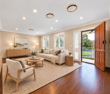 Spacious Four-Bedroom Family Home with Multiple Living Areas - Photo 1