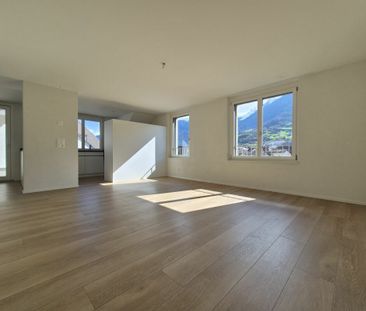 new 4.5-room duplex apartment with loggia in a central location - Photo 1