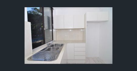 Two bedroom unit with parking - Photo 4