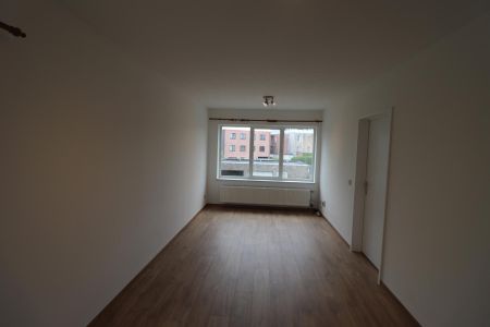 Een gerenoveerd appartement op de eerste verdieping achteraan met autostaanplaats - Foto 4