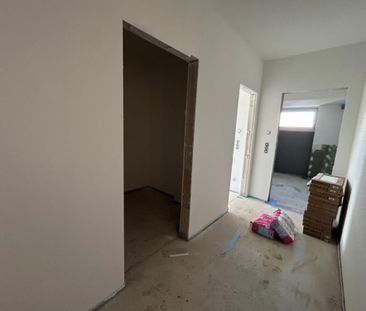 Erstbezug mit Aufzug und EBK in Tessin! - Photo 5