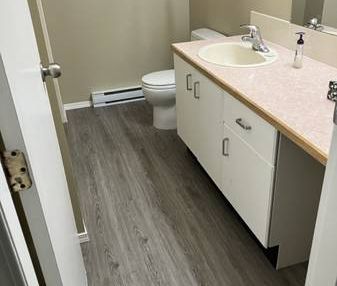 Bright, Clean, Spacious Full Height Suite in Great Location - Photo 1