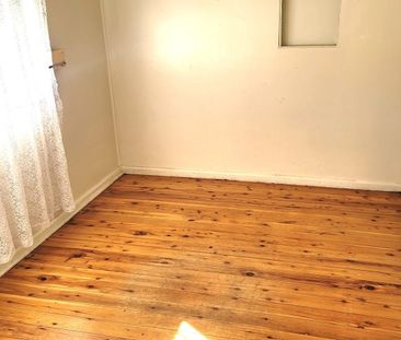 3BR/2Bath House + fenced carport. Walk to train! - Photo 3