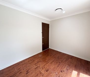 Modern Elegance and Family Comfort in a Prime Narellan Vale Location - Photo 4