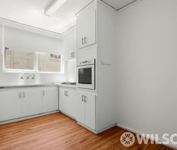 Large light filled unit in the perfect location - Photo 1