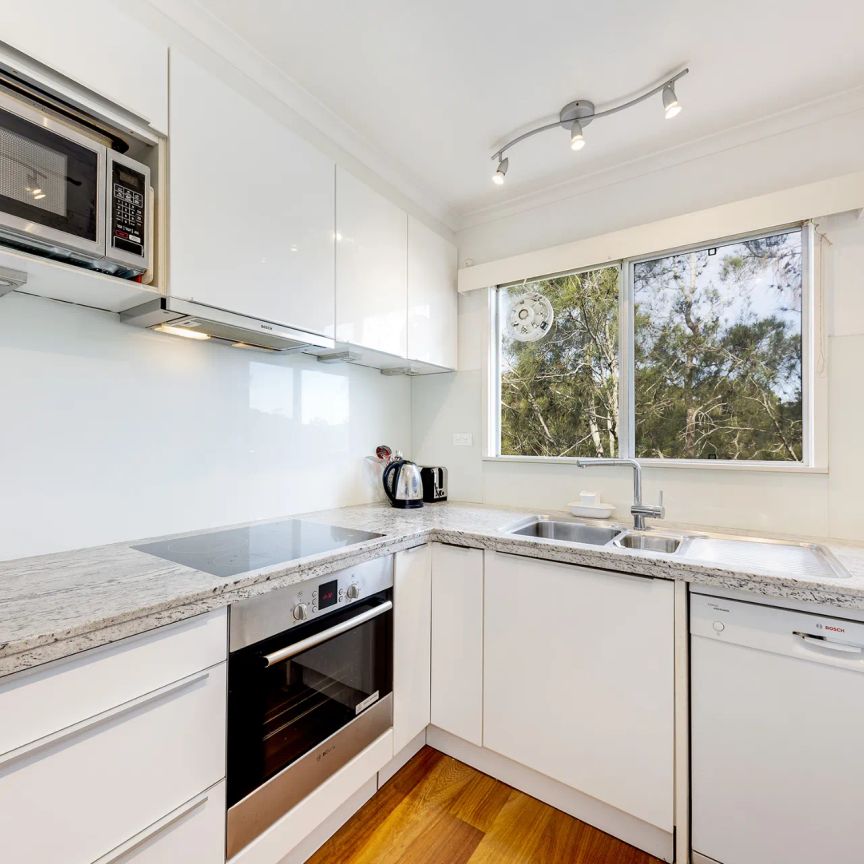 Fully Furnished Apartment with Water Views - Photo 1