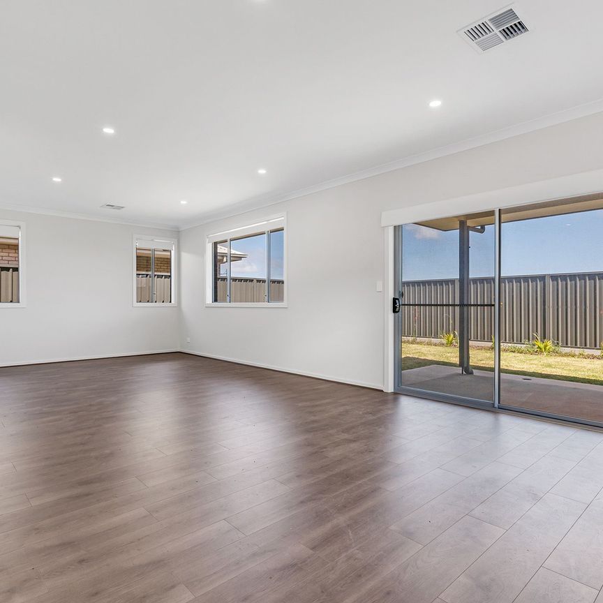 BRAND NEW 4 BEDROOM HOME - Photo 1