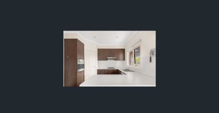 Immaculate Family Living: Streamlined Design in Sought-After Locale! - Photo 3