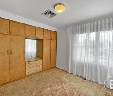 RECENTLY UPDATED THREE BEDROOM HOME WITH SHEDDING - Photo 1